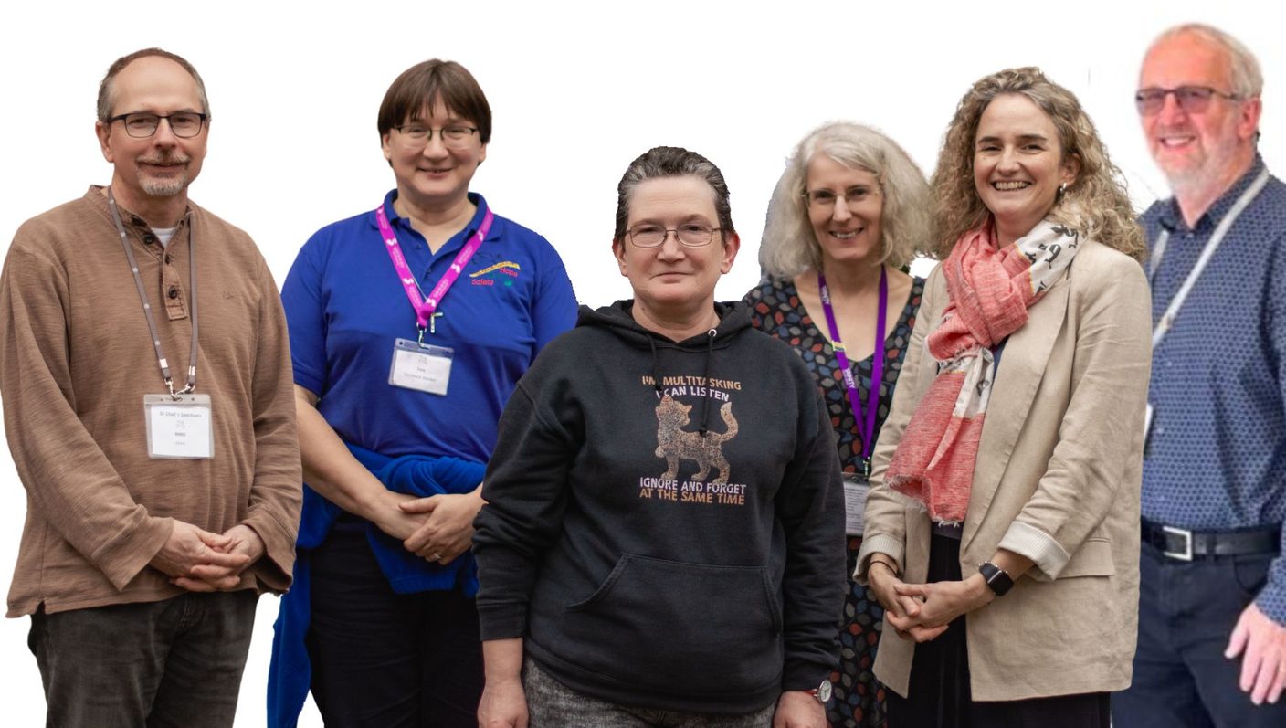 The St Chad's Sanctuary staff team standing together, smiling